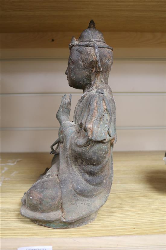 A Ming style bronze figure of a Buddha